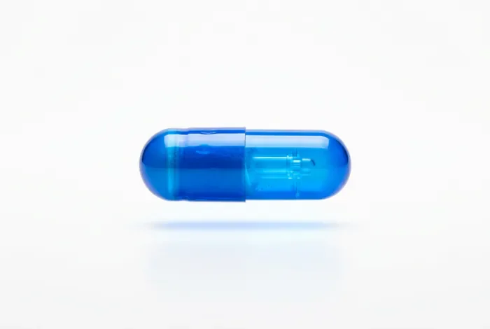 Prix du traitement par iode radioactif en 2026 Vue minimaliste d'une capsule médicale symbolisant le traitement