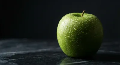 Une pomme verte fraîche symbolisant la santé digestive retrouvée